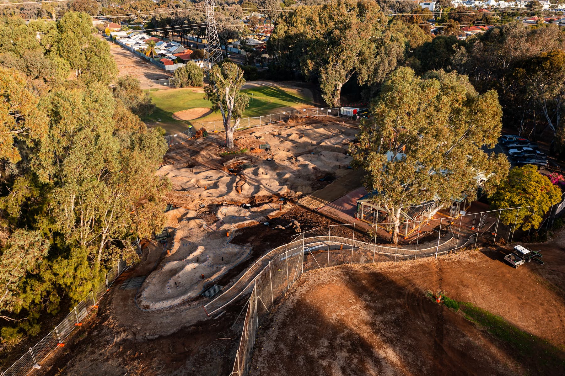 Overhead and from the side construction photo of Shanx mini golf course