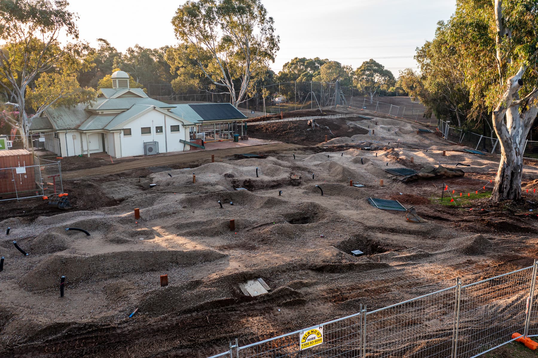Closer, elevated side construction photo of Shanx mini golf course